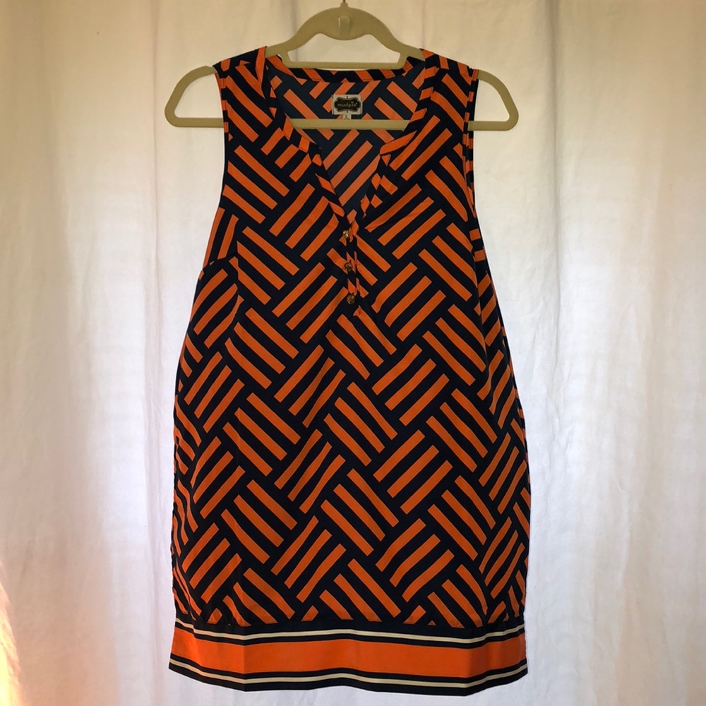 Sleeveless orange & blue blouse